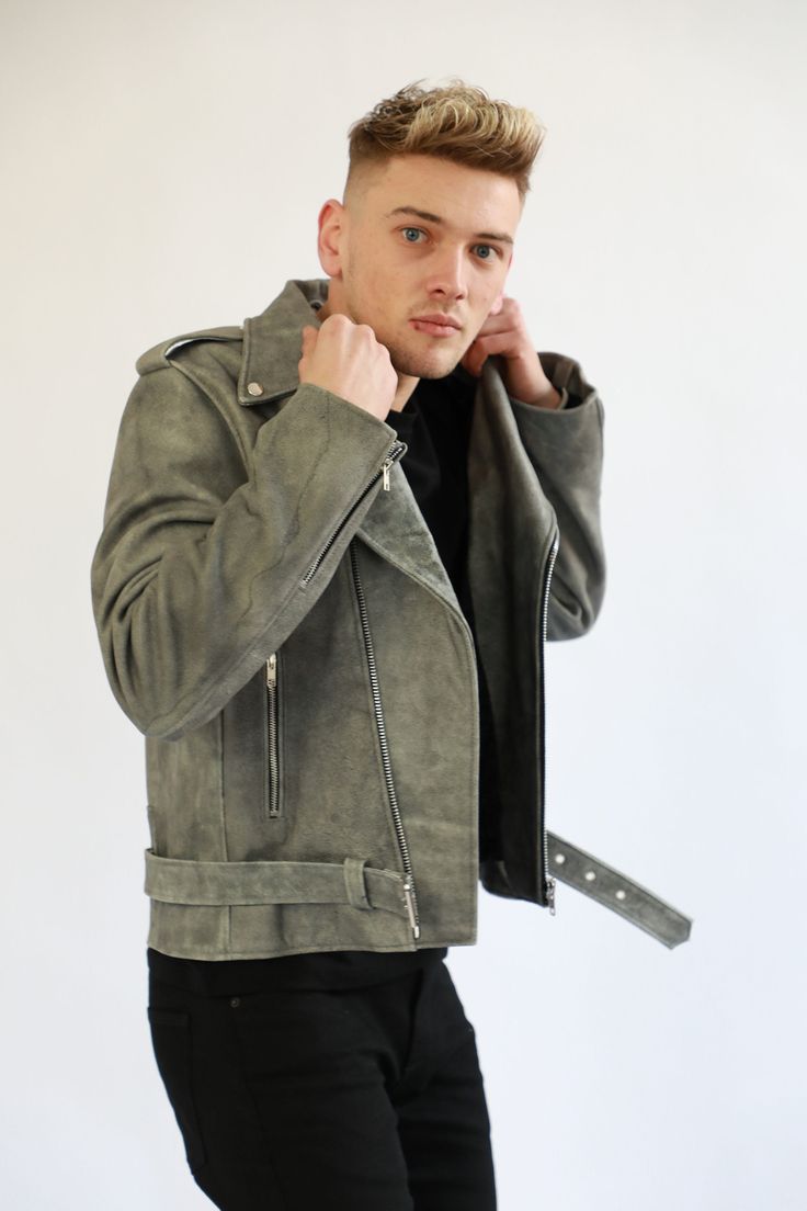 Made from 100% genuine leather In The UK, this biker jacket is an all time classic Marlon Brando style jacket. Soft, warm and comfortable and come in all sizes from 6 to 18. It has top button closure on the collars, silver zippers on front as well as on the sleeves and pockets. Fully lined inside. Made to last a long time without wear and perfect for rough day to day use. Classic Grey, Rough Day, Marlon Brando, Silver Zipper, Leather Biker Jacket, Style Expert, Grey Leather, Biker Jacket, All Time