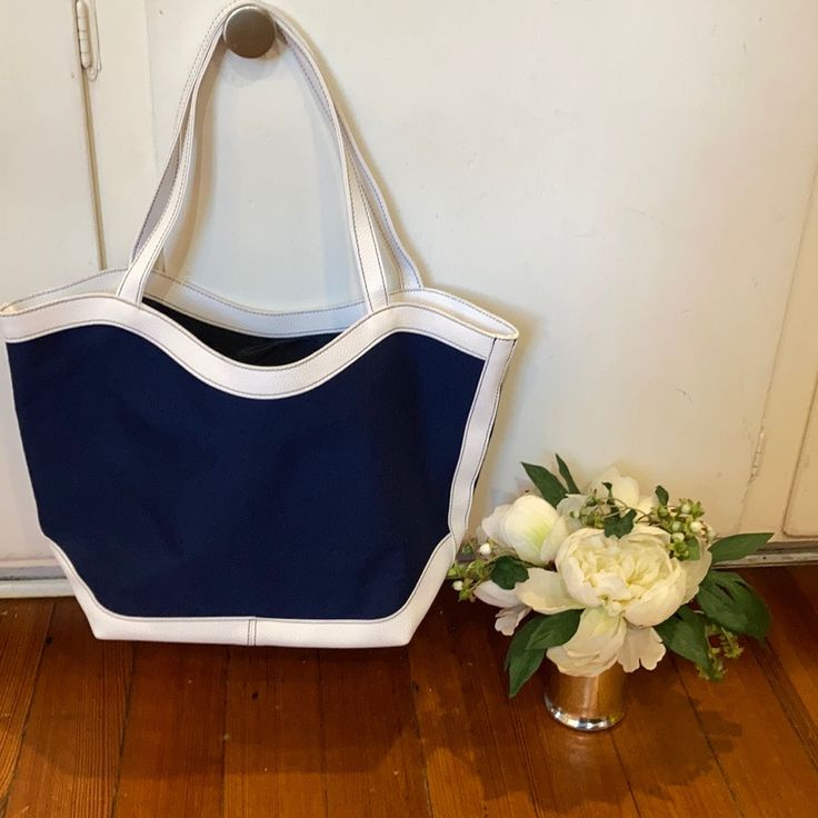 This Bag Is Brand New - Navy Blue And White Tote. Chic Blue Canvas Bag With Large Capacity, Chic Blue Canvas Shoulder Bag, Chic Blue Canvas Bag For Travel, Chic Large Capacity Blue Canvas Bag, Blue Canvas Tote Shoulder Bag, Chic Blue Rectangular Canvas Bag, Blue Beach Bag With Leather Handles For Travel, Blue Canvas Beach Bag For Shopping, Blue Leather Handle Shoulder Bag For Summer