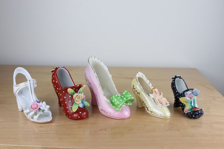 Pick the one you want: Ceramic Womens Shoes Sandal Slipper High Heeled Shoe Figurine This listing is for ONE shoe. Pick the one you want when you check out: White Sandal Red Shoe Pink Shoe Yellow Shoes Black Polka Dot Approx size of largest: 5 inches X 4 inches X 1 3/4 inches Approx size of smallest: 2.5 inches X 3.5 inches X 1 inch Made of breakable material. Most are made in Japan. I don't see any nicks in the ceramic in any of them. White Sandal, Mantle Piece, Yellow Shoes, Vintage Models, White Sandals, Cat Sitting, Pink Shoes, Black Polka Dot, Red Shoes