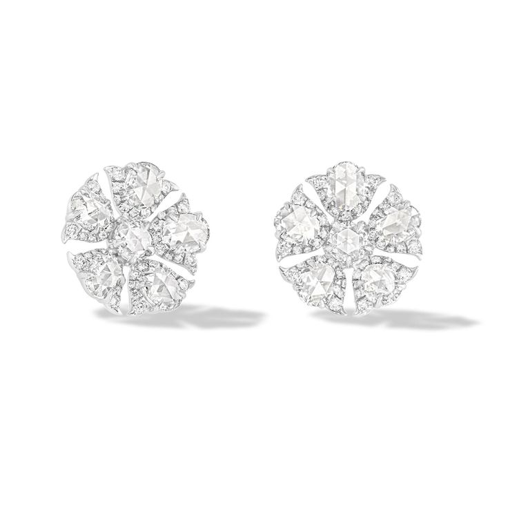 64facets rose cut diamond stud earrings in the shape of tulip flowers and set in 18k gold Luxury Flower Shaped Cluster Earrings For Formal Occasions, Luxury Flower Shaped Cluster Earrings For Formal Events, Luxury Flower-shaped Cluster Earrings For Formal Occasions, Formal Flower-shaped Diamond Earrings With Single Cut Diamonds, Diamond White Earrings With Single Cut Diamonds For Evening, Formal Flower Shaped Earrings With Single Cut Diamonds, White Diamond Cluster Earrings For Evening, Formal Flower-shaped Single Cut Diamond Earrings, Luxury Cluster Earrings With Brilliant Cut For Evening