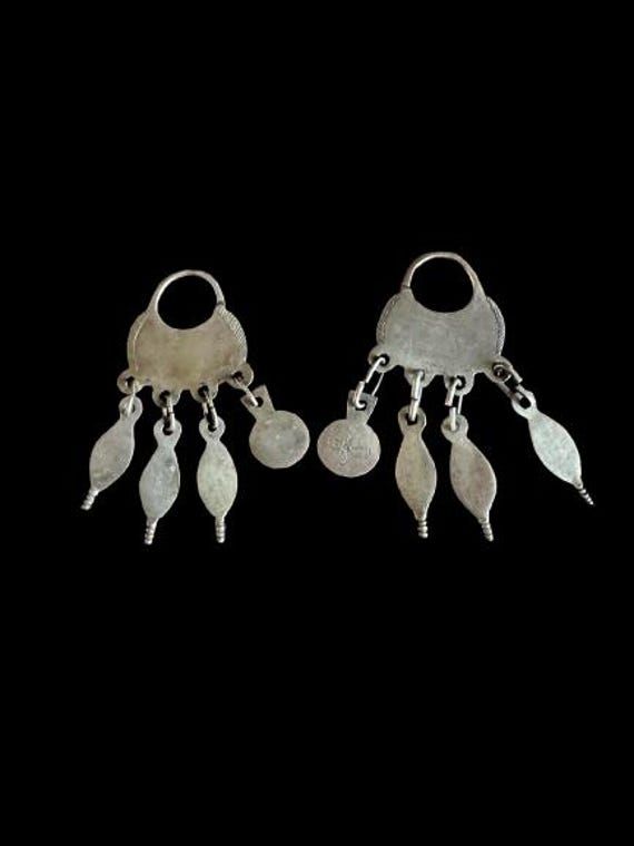 Amazing antique Mapuche silver earrings . This pair is from circa 1880 which make them  quite rare. The  estate I  picked them up from the person was a professor of anthropology and his family collected all sorts of beautiful objects around the world for several generations actually many pieces were given back  to muesums  of there county of origin  Inwas told.   With this particular jewellery they used silver that they mined  , but also use silver coins (which they mined for the  coins) and in Vintage Ceremonial Drop Earrings, Vintage Drop Earrings For Ceremonial Occasion, Antique Ceremonial Dangle Earrings, Antique Ceremonial Earrings For Pierced Ears, Antique Dangle Earrings For Ceremonies, Traditional Sterling Silver Chandelier Earrings, Traditional Silver Chandelier Earrings For Ceremonial Occasions, Traditional Single Earring For Ceremonial Occasions, Antique Sterling Silver Dangle Earrings