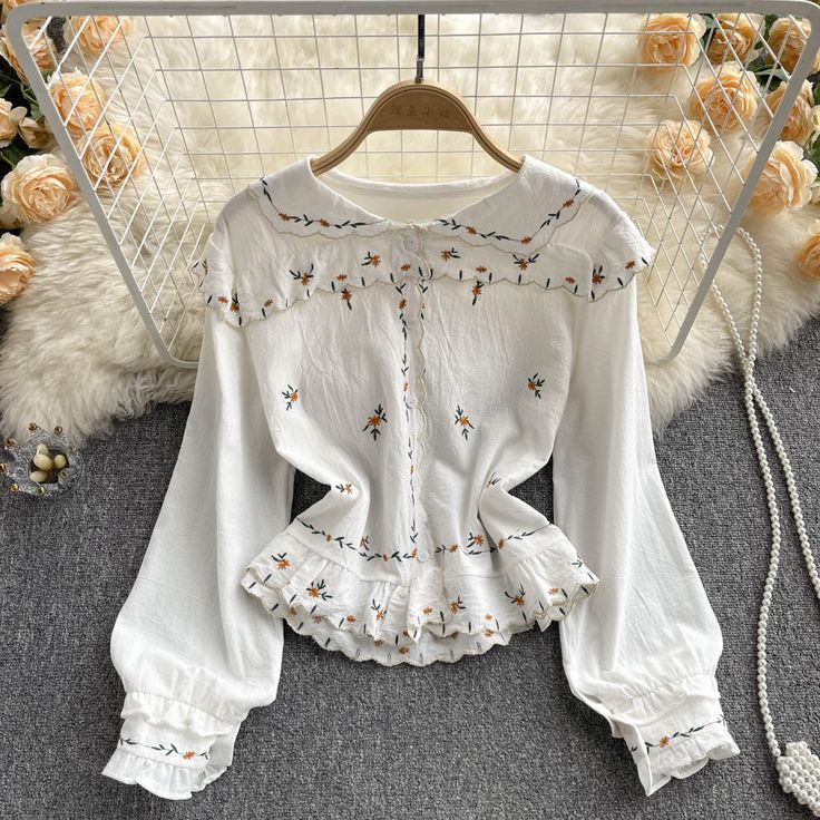 Cute embroidered topFabric: blendedColor: whiteSize(cm): free size(1inch=2.54cm)length 46cm bust 98cm sleeve length 36cmPlease check the size carefully when you choose items.For more pictures of the tops, please contact us, thank you. White Crew Neck Top With Floral Embroidery, Casual White Blouse With Floral Embroidery, White Embroidered Long Sleeve Top, Long Sleeve Tops With Geometric Embroidery For Summer, White Crew Neck Blouse With Floral Embroidery, Cute Floral Embroidery Fall Tops, White Long Sleeve Top With Embroidered Hem, White Long Sleeve Blouse With Embroidered Hem, Cute White Blouse With Floral Embroidery