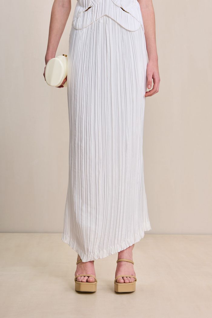 A column maxi skirt designed in plissé with an angular hem. — Elastic waist — Classic column silhouette — Plissé fabric — Pair with the Gami Top Classic Column, Plisse Fabric, Autumn Sales, Cult Gaia, Candle Collection, Kids Sandals, Skirt Design, Kids' Dresses, Platform Sandals