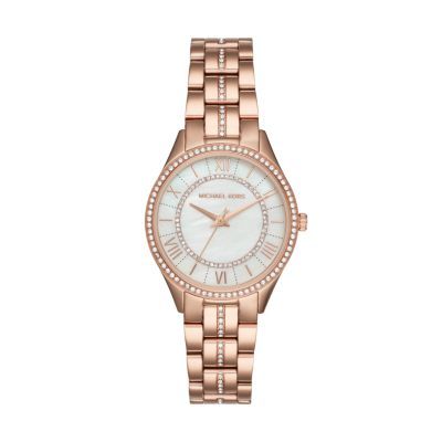 Lauryn Rose Gold-Tone Three-Hand Watch A sleek three-link-bracelet with glitz detailing down the center and sparkling crystal topring make the rose gold-tone Michael Kors Lauryn this season's most irresistible timepiece. The chic white dial features a pavé inner dial ring and rose gold-tone Roman numeral indexes. Watches Women Michael Kors, Mk Watch, Girls Watches, Rose Gold Jewelry, Women's Watch, Watch Movement, White Dial, Stainless Steel Watch, Michael Kors Watch