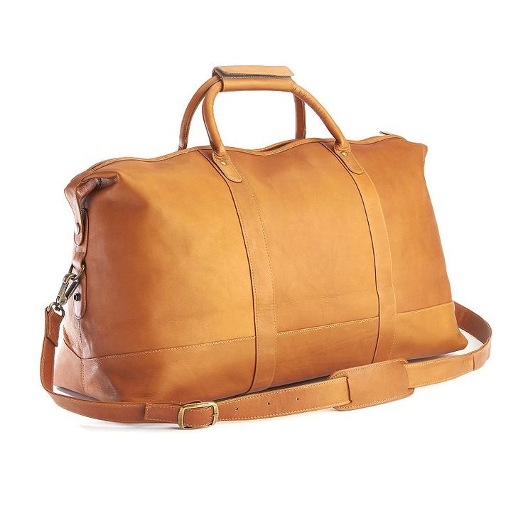 "This fashionable and functional weekender duffel bag from Royce Leather is the perfect carry-on for your next trip. This fashionable and functional weekender duffel bag from Royce Leather is the perfect carry-on for your next trip. LUGGAGE FEATURES 2 large, zippered interior pockets Exterior pocket for instant accessLUGGAGE SIZING 24.5""W x 14.5""H x 9""DLUGGAGE DETAILS Zipper closure Colombian vaquetta leather Imported Manufacturer's 1-year warranty For warranty information please click here S Leather Duffel Bag, Leather Weekender Bag, Leather Duffel, Leather Weekender, Weekend Travel Bags, Crocodile Bags, Weekend Bag, Duffel Bags, American Leather