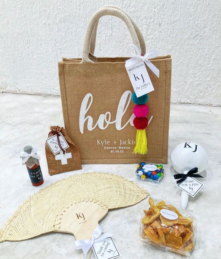 a brown bag sitting on top of a white floor next to other items in front of it