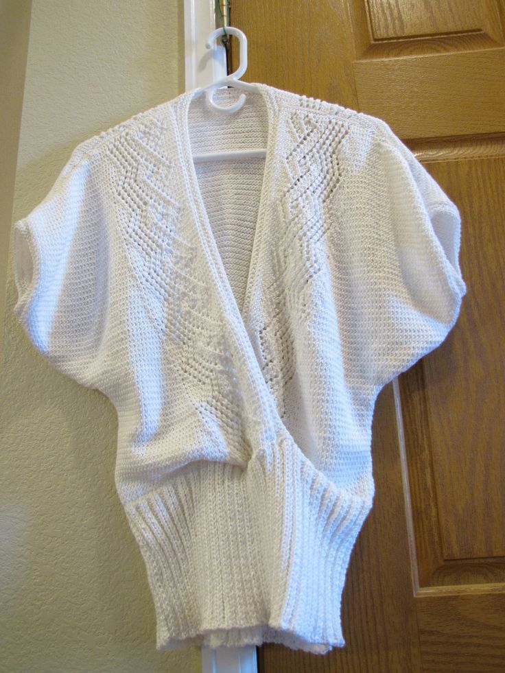 "Women's Blouse Hand Knitting White Top Short Bat Sleeve Open Top and Jump Waist Sweater. Made of 100% rayon from bamboo yarn. Approximately measurements : pit to pit     17\" cuff     6\" length     23\" bottom ( jump waist )      14\" Machine wash cool, gentle cycle, lay flat to dry. *Note - Do the best to get photos of the actual color, but may be the color is a bit off from the color from the color. All measurement are taken by hand, laid flat and approximate. Please make sure about the size Stretch V-neck Knit Top, Winter V-neck Knitted Tops, Winter Knitted V-neck Tops, Knitted V-neck Top For Winter, Handmade Pullover, Handmade Blouse, Bamboo Yarn, Handmade Sweater, Bat Sleeve