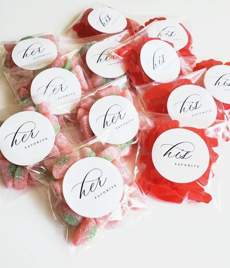 small candy candies in cello bags with labels on them for wedding guests to eat