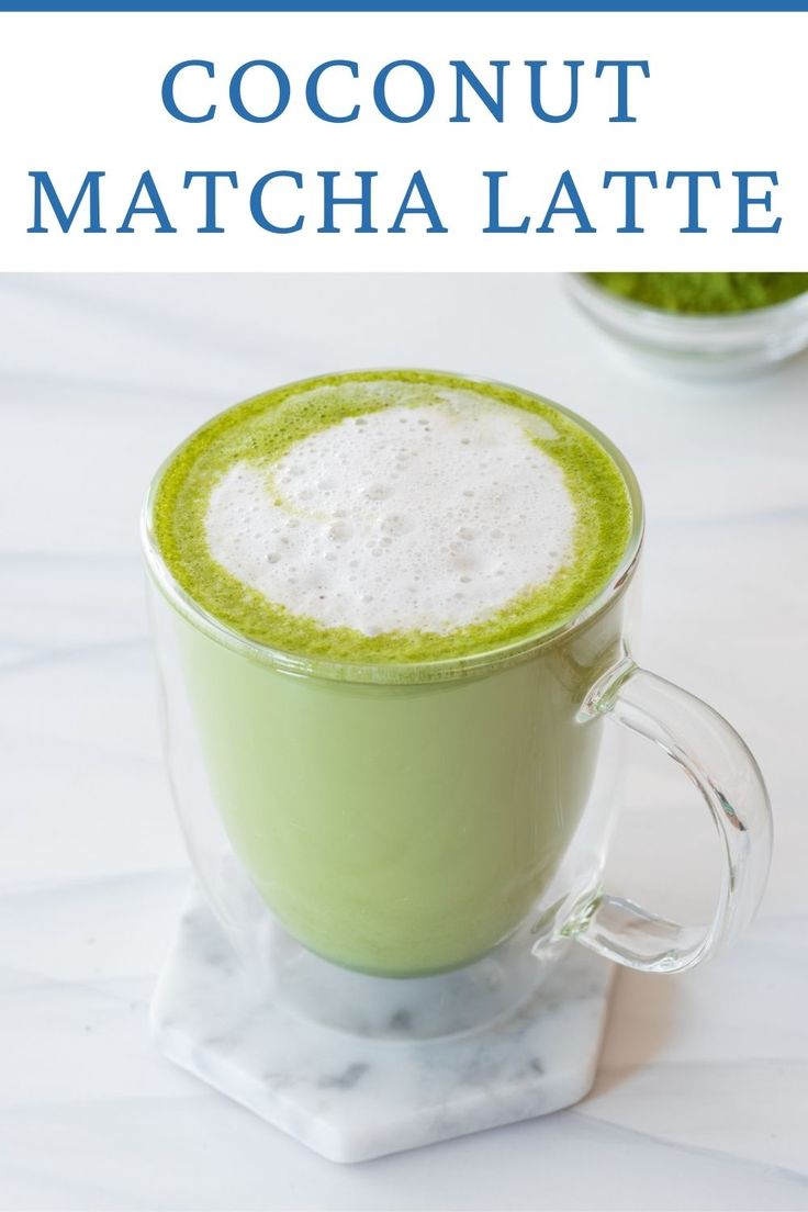 there is a green drink in the cup on the table with text overlay that reads coconut matcha latte