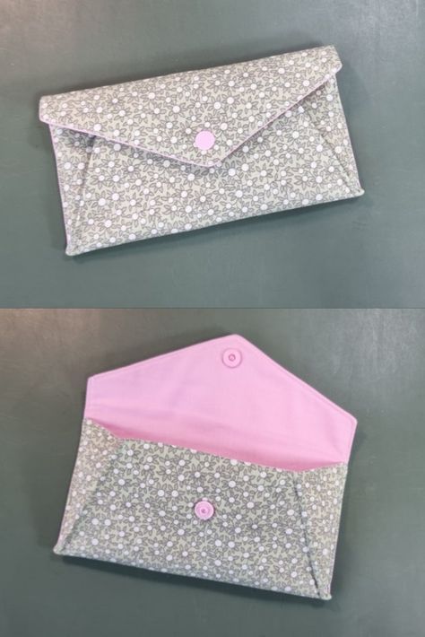 two envelopes sitting side by side, one with pink and white flowers on it