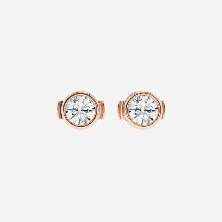 We adore these stud earrings.  The round lab grown diamonds are featured in a feminine filigree setting and encased in a bezel.  If you're looking for a little something special, then these are the studs for you. Rose Gold Single Diamond Earrings For Anniversary, Elegant 14k Rose Gold Round Earrings, Rose Gold Diamond Earrings With Single Round Cut, Rose Gold Round Cut Single Diamond Earrings, Rose Gold Round Cut Earrings With Single Diamond, Classic Rose Gold Earrings With Single Diamond, Classic Rose Gold Earrings For Anniversary, Rose Gold Round Cut Diamond Earrings For Formal Occasions, Rose Gold Round Cut Diamond Earrings For Formal