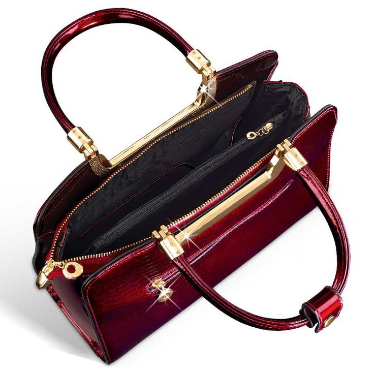 Exquisitely crafted in beautiful ruby-red, gloss-finish fine leather with an embossed mock-croc pattern, this is a designer-quality bag you’ll want to take everywhere! Gleaming golden accessories and a jet-black lining add the right amount of glamour. But to make this handbag truly unique to you, it comes with three golden dangling charms—a pretty heart and your initials!The Ruby Red Genuine Leather Handbag is big enough to fit all the essentials. Inside, the bag has a classic black lining and f Red Leather Bags With Glossy Finish, Elegant Red Bag With Glossy Finish, Luxury Shoulder Bag With Glossy Finish And Double Handle, Luxury Glossy Formal Bags, Luxury Bags With Glossy Finish For Formal Occasions, Luxury Glossy Finish Formal Bags, Luxury Glossy Finish Top Handle Bags, Evening Bags With Glossy Finish And Double Handle, Red Glossy Formal Bags