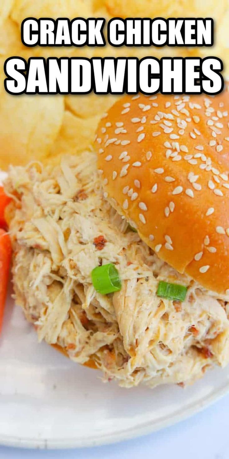 a sandwich with shredded chicken and carrots on a plate