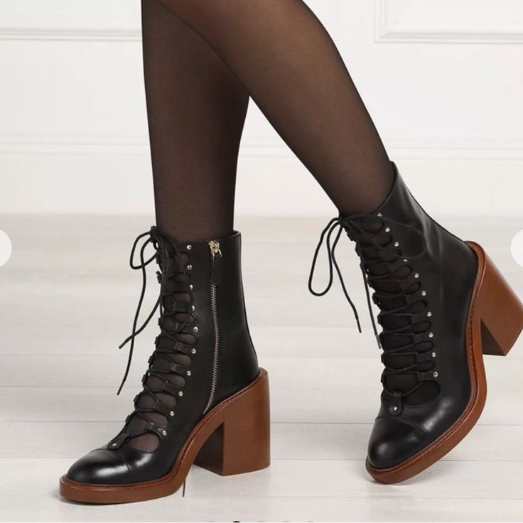 Lace-Up 100mm Boots From Chlo Featuring Black, Brown, Calf Leather, Round Toe, Front Lace-Up Fastening, Side Zip Fastening And High Block Heel. Composition Lining: Calf Leather 100% Sole: Calf Leather 100% Outer: Calf Leather 100% Size 39 Elegant Black Lace-up Boots For Work, Leather High Heel Lace-up Boots With Reinforced Heel, Leather Lace-up Heels With Padded Heel, Leather Lace-up Boots With Reinforced High Heel, Chic Lace-up Boots With Leather Sole, Low Heel Leather Sole Heeled Boots For Office, Chic Leather Lace-up Boots With Reinforced Heel, Office Heeled Boots With Leather Sole And Low Heel, Office Low Heel Boots With Leather Sole