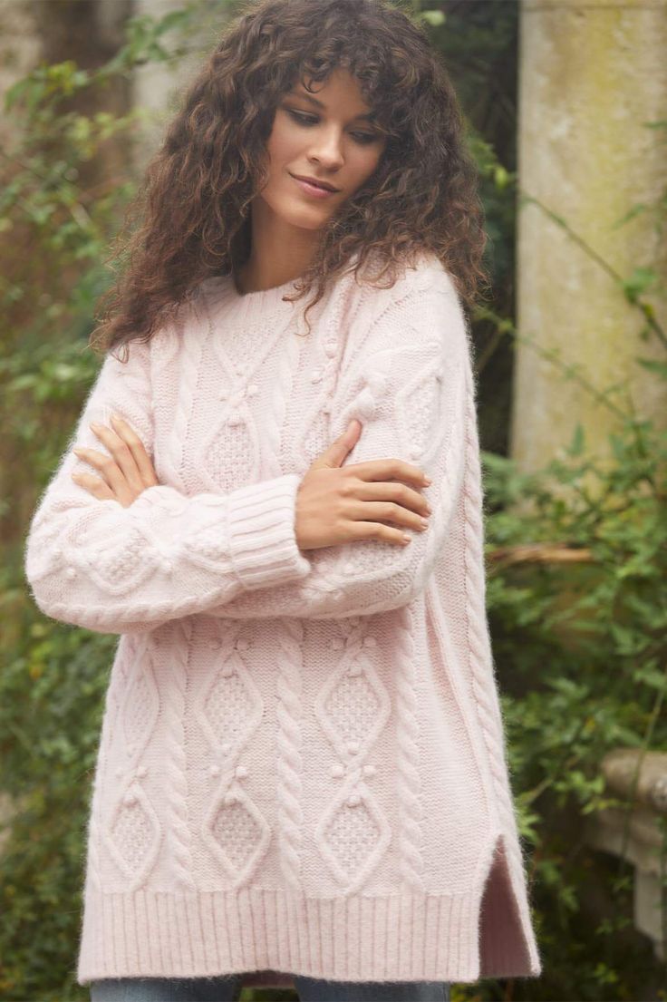 Sylvie Cable Longline Jumper – Pink | Needle & Thread Pink Jumper Outfit, Cable Jumper, Cosy Jumper, Jumper Outfit, Textured Yarn, Loose Sleeves, Short Cardigan, Needle Thread, Crochet Trim