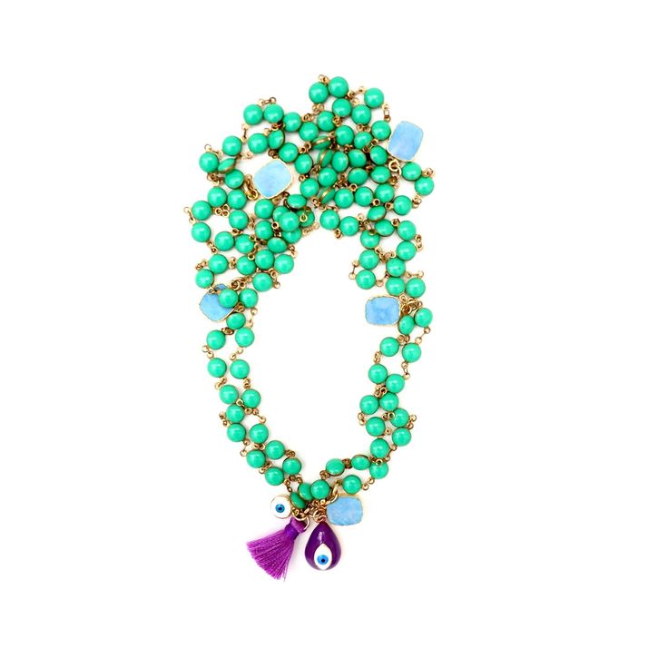 Handcrafted truly one-of-a-kind unique necklace, a vintage chain with gorgeous green enamel stones, little square shaped turquoise charms throughout, enamel purple tear drop shape evil eye pendant, silk tassel and a tiny evil eye charm. Wear it long, doubled or tripled in any way creative way you like. Necklace is 38" in length Variety of different charms Vintage enamel chain Made with love in Los Angeles Complimentary gift wrapping provided All sales final. Green Dangle Charm Necklace, Green Charm Necklace With Dangling Charms For Gift, Green Dangle Charm Necklaces, Green Jewelry With Dangling Charms For Gift, Green Jewelry With Dangling Charms As Gift, Green Vintage Charm Jewelry For Gift, Green Vintage Charm Jewelry Gift, Green Necklaces With Dangling Charms For Gifts, Green Necklace With Dangling Charms For Gift