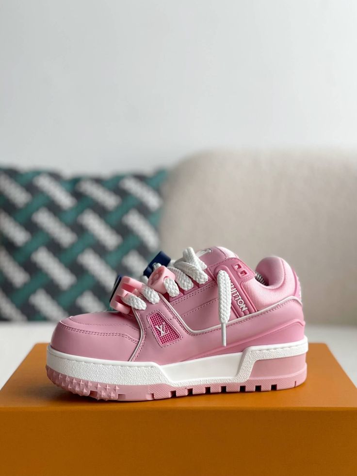 Embrace bold, statement-making style with these LV Trainer Maxi-inspired sneakers. This exaggerated take on the iconic Louis Vuitton Trainer features a vibrant pink colorway and an oversized silhouette for a playful and fashion-forward look. Crafted with meticulous attention to detail, these sneakers offer a premium blend of comfort and luxury, perfect for those who dare to stand out. Your order arrives in a branded shoe box, complete with dust bags, extra laces, socks, a care booklet, and a bra Trendy Pink Sneakers With Contrast Sole, Trendy Pink High-top Sneakers With Contrast Sole, Pink Sneakers With Studded Rubber Outsoles For Spring, Designer Platform Sneakers With Round Toe For Streetwear, Pink Casual Platform Sneakers With Abzorb Midsole, Trendy Pink Platform Sneakers With Rubber Sole, Trendy Pink High-top Sneakers, Luxury Pink Sneakers For Spring, Trendy Pink High-top Sneakers For Streetwear