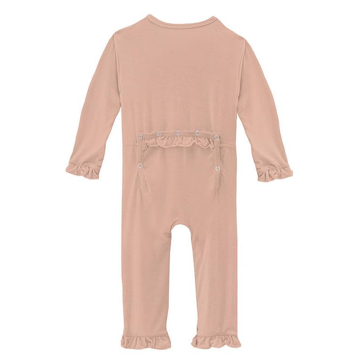 The Kickee Pants classic ruffle coveralls are perfect for a day outfit or sleep! These cute jammies are super soft, stretchy and absolutely beautiful!About Me: Silky-smooth fabric...actually it is quite addicting Ultra gentle and comfortable next to your baby's skin Perfect for sleep and play Classic ruffles on the front and back for extra cuteness Made of 95% Viscose from Bamboo, 5% Spandex Viscose from bamboo is a natural wicking material Keeps baby warm, dry and odor free Print and Style: Kickee Pants Ruffle Coverall with Zipper - Peach Blossom Collection: First Day of School Long Sleeve Onesie For Sleepover In Spring, Spring Ruffled Onesie For Loungewear, Spring Loungewear Onesie With Ruffles, Spring Onesie With Ruffles In Solid Color, Solid Color Onesie With Ruffles For Spring, Casual Ruffled Onesie For Playwear, Casual Onesie With Ruffles For Playwear, Fitted Long Sleeve Onesie With Ruffles, Fitted Long-sleeved Onesie With Ruffles