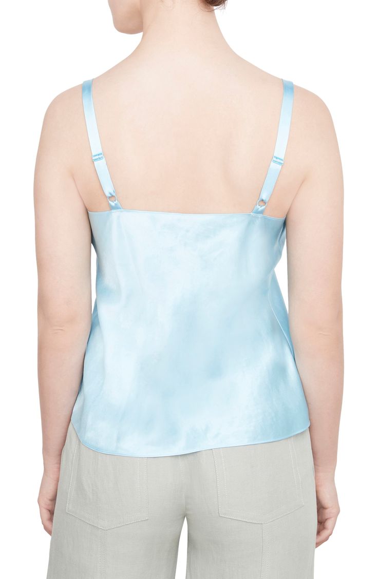 Crafted from glossy satin, this staple cami features slinky straps and a drapey cowl neck. Cowl neck Adjustable straps 100% Naia™ acetate Naia™ acetate is a cellulosic fiber consisting of 60% sustainable wood pulp and 40% certified recycled material and is OEKO-TEX® Standard 100 certified Hand wash, line dry Imported Silk Cami Top With Built-in Bra, Fitted Sleeveless Satin Tank Top, Fitted Satin Finish Sleeveless Tank Top, Satin Tank Top With Built-in Bra, Fitted Satin Finish Camisole Top, Fitted Satin Finish Sleeveless Camisole, Spring Satin Top With Adjustable Straps, Sleeveless Satin Tops With Bias Cut, Sleeveless Satin Finish Tops For Spring