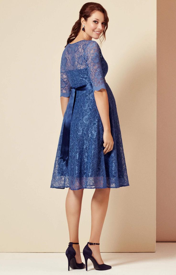 The fun, floaty shape of our Flossie maternity party dress makes it perfect for parties. Cut from premium corded blue floral lace and lined with contrasting dusky blue jersey. The adorable vintage touches are in abundance, from the scallop edging to the stylish ¾ sleeves – to smooth and flatter hips and bump. The perfect dress to see you through a stylish engagement during pregnancy, finish at the waist with a glorious French Blue satin sash (sold separately) to cinch you beautifully. Sweetheart Blue Lace Dress With Lace Bodice For Spring, Blue Knee-length Dress With Lace Patchwork, Summer Party Maternity Dress In Lace, Summer Party Lace Maternity Dress, Summer Party Maternity Lace Dress, Blue Fitted Dress With Lace Patchwork, Blue Lace Patchwork Dress For Party, Blue Lace Dress For Spring Wedding Guest, Blue Lace Dress With Lace Patchwork