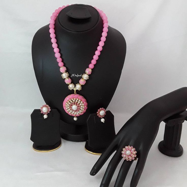 Indian fashion Jaipuri pearl, pachi moti bridal mala haar necklace set with matching stud earrings and adjustable ring. Handcrafted with pearl and pachi moti. This beautiful necklace earrings set is designed with lot of intricate work. It is perfect match with your formal attire on special occasion or with casual wearing and saree. Main Colour: Gold Pearl Colour: Pink & Ivory Necklace Full Length: 29cm Necklace Closer: Hook Earrings Size: L x 3.5cm / W x 2cm  Earrings Back: Push Back  Ring Size: Bollywood Style Round Jewelry For Puja, Festive Round Pearl Jewelry, Round Pearl Drop Jewelry For Festivals, Festival Jewelry With Pearl Drop, Kundan Jewelry Sets For Puja, Diwali Jewelry Sets With Stone Work, Round Pearl Drop Jewelry For Diwali, Pearl Jewelry For Diwali Party, Diwali Stone Work Round Jewelry Sets