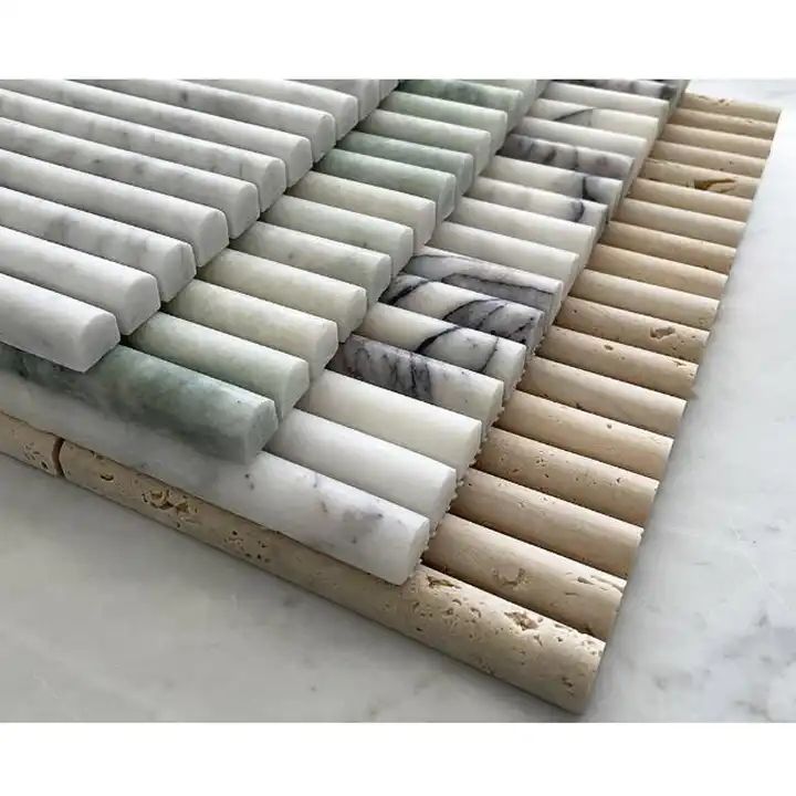 a close up of a bamboo mat with marble tiles on it