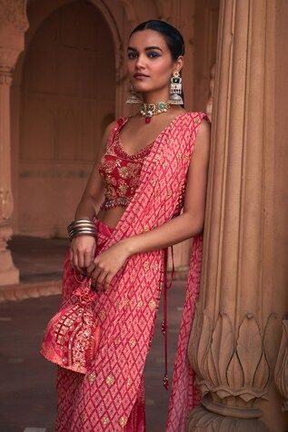 Maroon pre-draped gharara saree with thikri, grid and floral print and sequins embroidery. Comes with a padded blouse and a potli bag. - Aza Fashions Semi-stitched Festival Blouse Piece With Latkans, Semi-stitched Blouse Piece With Latkans For Festivals, Diwali Saree Blouse Piece With Latkans, Festive Semi-stitched Blouse Piece With Latkans, Navratri Sharara With Latkans, Eid Sharara With Latkans, Bollywood Blouse Piece With Latkans For Diwali, Traditional Blouse Piece With Latkans For Eid, Eid Traditional Drape Blouse Piece With Latkans