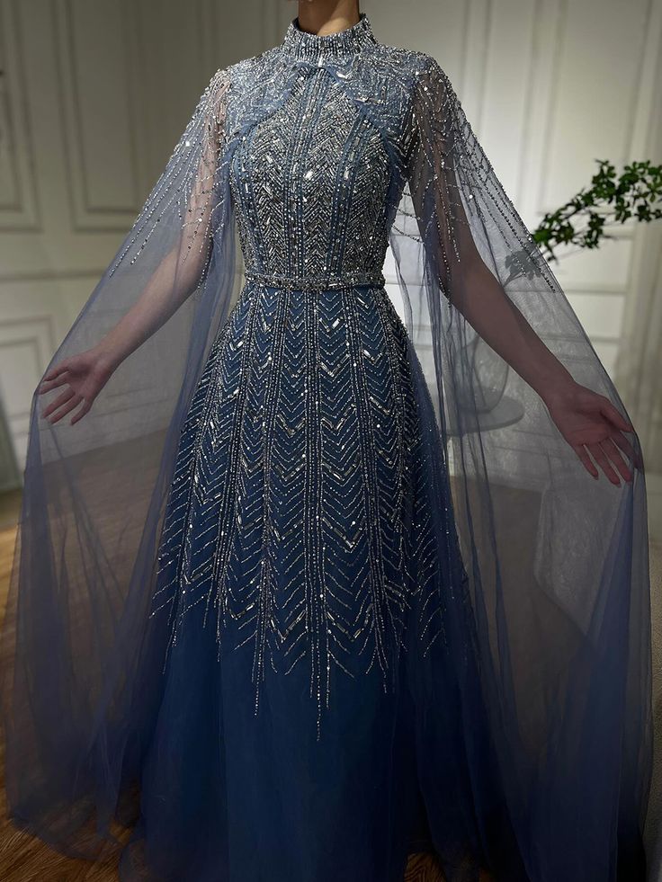 Serene Hill 2024 Blue Beaded Design A-Line Saudi Arabic Evening Dresses Gowns with Cape Sleeves for Prom Dress With Cape, Gown Cape, Debut Gowns, Gown With Cape, Sheer Cape, Dress With Cape, Beaded Evening Gowns, Prom Inspiration, Prom Dress Inspo