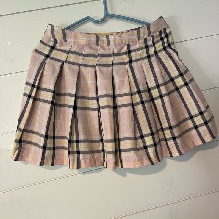 Brand New With Tags Pleated Skirt Size Large. Button And Zipped On The Side. The Colors Are A Light Pink Plaid With Black, White, And A Hint Of Yellow. Absolutely Cute. Comes From A Smoke Free Home. Brand Is Faded Rose. Pink Pleated Shorts, Casual Pink Skort For School, Summer School Pink Pleated Skirt, Pink Pleated Skirt For School In Summer, Preppy Pink Bottoms For School, Pink Pleated Casual Shorts, Casual Pink Pleated Shorts, High Waist Pink Mini Skirt For School, Pink Mini Skort For School