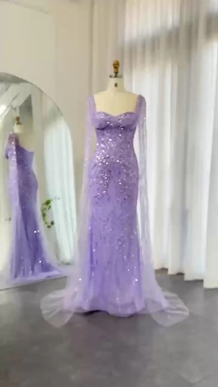 a dress on display in front of a mirror