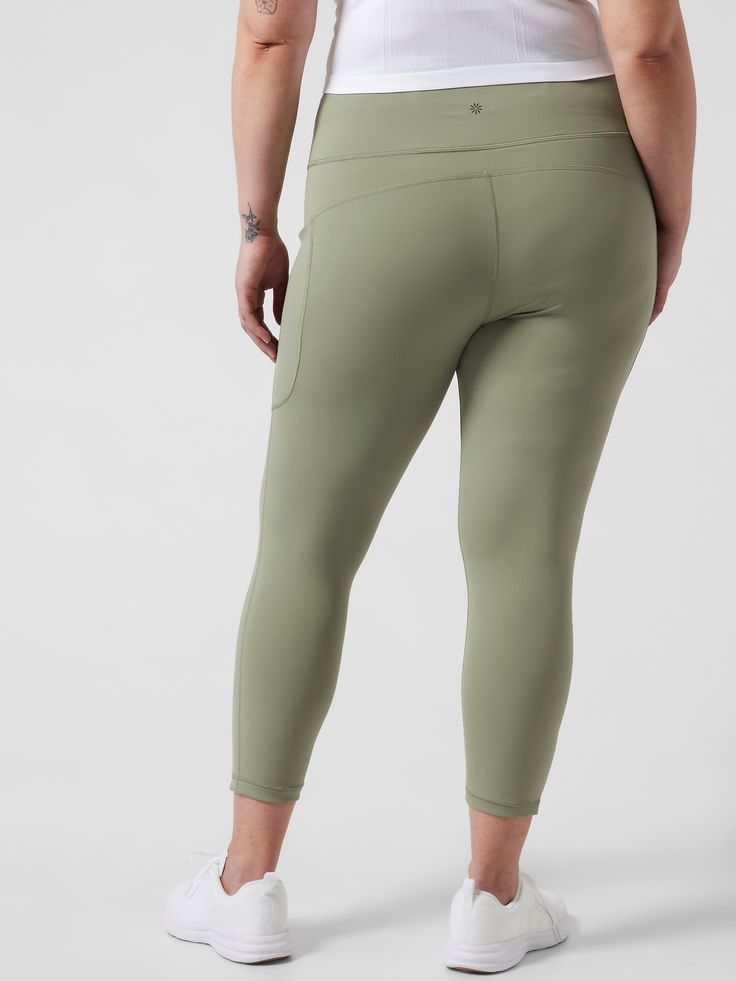 FOR: Medium to high impact workouts at the gym, studio, or outdoors FEEL: SuperSonic fabric, made with recycled material, is sleek with supportive compression FAVE: Back drop in pocket to store phone or keys New and improved design with large side st Green Activewear With Side Pockets For Yoga, 4-way Stretch Activewear With Side Pockets For Running, Green Activewear With Side Pockets For Sports, Green Activewear With Side Pockets For Gym, Sporty Compression Activewear With Functional Pockets, Compressive Athleisure Yoga Pants With Pockets, Yoga Activewear With 4-way Stretch And Side Pockets, Yoga Activewear With Side Pockets And 4-way Stretch, Sporty Activewear With Functional Pockets For Pilates