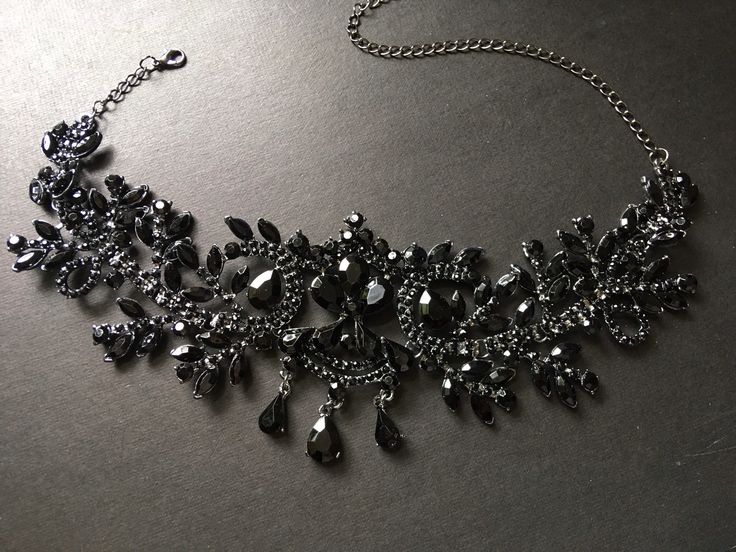 "This romantic and gothic style design wedding bridal choker necklace linked to cable chain finished with sparkle crystals at end for you to adjust the length. Size: necklace measures around 14.5\" long x center drop 3.1\" Color: dark silver with black rhinestone crystals and glass stones Item ship out with tracking number to you (around 10 to 14 business days for delivery). We also provide fast shipping service, around 3-4 business days delivery but need to add extra charge. Please convo us if Luxury Black Spinel Jewelry For Evening, Elegant Black Choker Jewelry, Elegant Black Formal Choker, Black Wedding Jewelry With Jewels, Elegant Black Necklace With Jewels, Elegant Black Rhinestone Necklace For Wedding, Wedding Rhinestone Choker Necklace With Adjustable Chain, Black Evening Jewelry With Adjustable Chain, Formal Black Necklace With Jewels