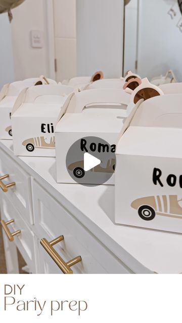 a row of boxes that are on top of a dresser with the words roma written on them