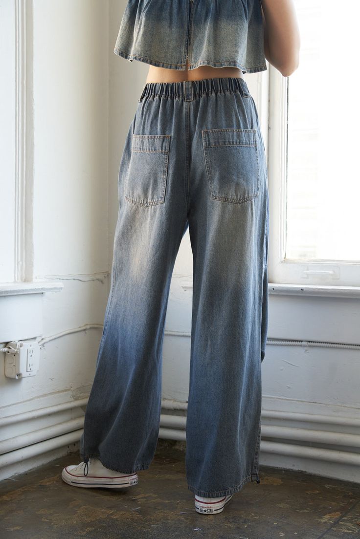 A washed denim pant featuring front closure, side pocket, wide leg, back elasticized waist, back pocket and bottom toggle pull tieDetails:Self : 100% Cotton Size & Fit- Model is 5`9" And Wearing Size Small- Measurements Taken From Size Small- Approx. Length: 44" Casual High Rise Pre-washed Bottoms, Dark Wash Pre-washed Straight Leg Bottoms, Wide Leg Washed Blue Cargo Jeans With Belt Loops, Spring Pre-washed Wide Leg Jeans, Spring Wide-leg Pre-washed Jeans, Pre-washed Wide Leg Jeans For Spring, Spring Wide Leg Pre-washed Jeans, Washed Blue Wide Leg Utility Pants, Casual Pre-washed Wide Leg Pants