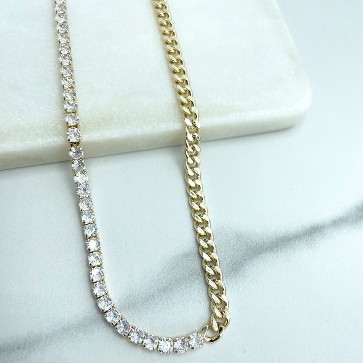 14k Gold Filled Necklace with Half Side Clear Tennis Zirconia & Half Side Curb Link Chain, 17.5 Inches and Extender, Wholesale Price Jewelry. Necklaces Size: - Length:  17.5 Inches with 2 Inches of extender - Thickness: 3mm 💎 With new products daily, quality and competitive prices, in DiJu Jewelry you find the most unique styles of modern designs, always looking for elegance and market trends.  *Helping your Jewelry Businesses Grow *Starting your Own Business *Making your Own Collection: DiJu Jewelry ever brings Better Moments for your Life.  📲 Find many more styles in our DiJu Jewelry Etsy Store:https://www.etsy.com/shop/DJDiJuJewelry  💎 You can choose from unique styles of earrings, necklaces, pendants and charms, bracelets, anklets, rings, chokers, and many others. On the off chance Cubic Zirconia Diamond Necklace With Curb Chain For Gifting, Gold Tennis Necklace With Diamond Accents As A Gift, Cubic Zirconia Curb Chain Necklace, Gold Cubic Zirconia Tennis Necklace Gift, Gold Tennis Necklace With Adjustable Chain And Cubic Zirconia, Gold Cubic Zirconia Diamond Necklace With Curb Chain, Gold Cuban Link Tennis Necklace For Gift, Gold Filled Necklace, Solid Gold Jewelry