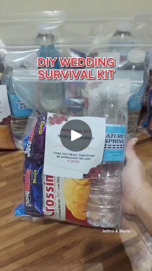 a person is holding up a bag of water and some snacks on a table with the words diy wedding survival kit