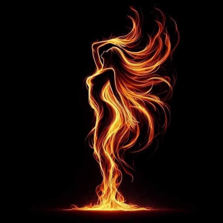 the silhouette of a woman with long hair is shown in flames on a black background