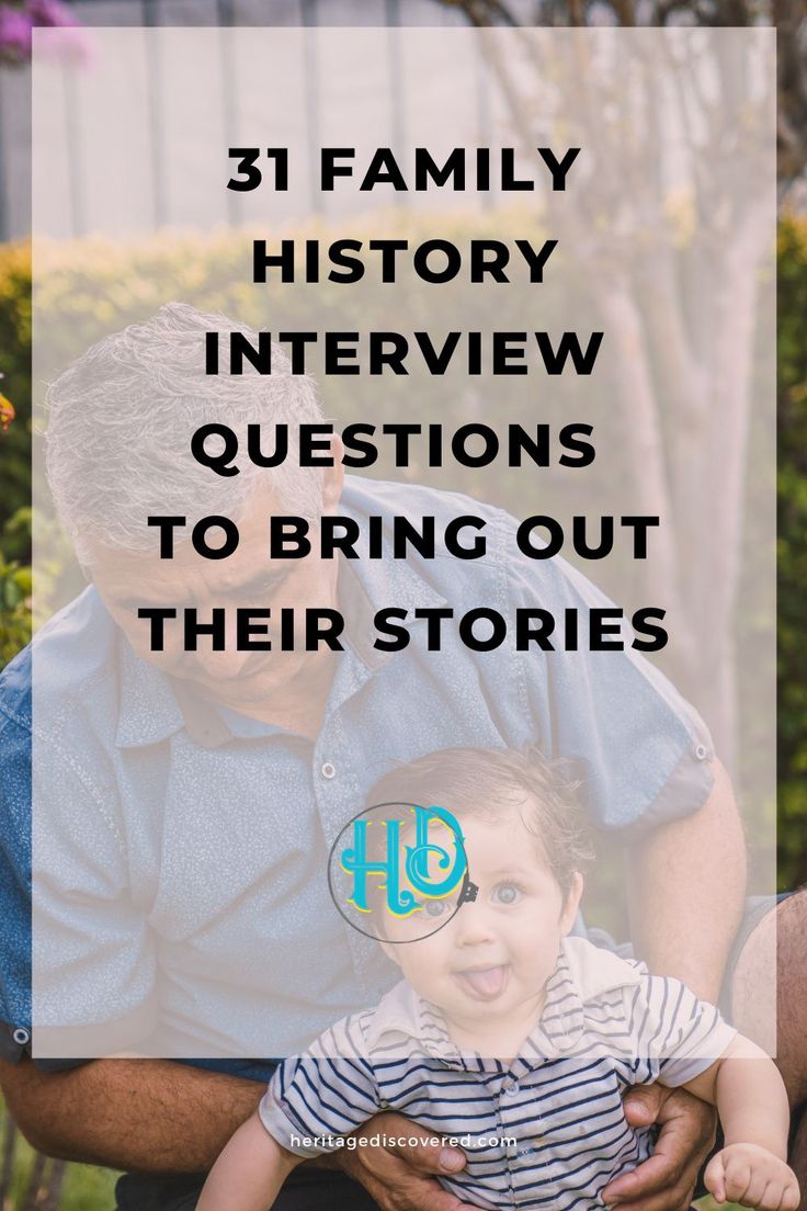 a man holding a baby in his lap with the words 31 family history interview questions to bring out their stories