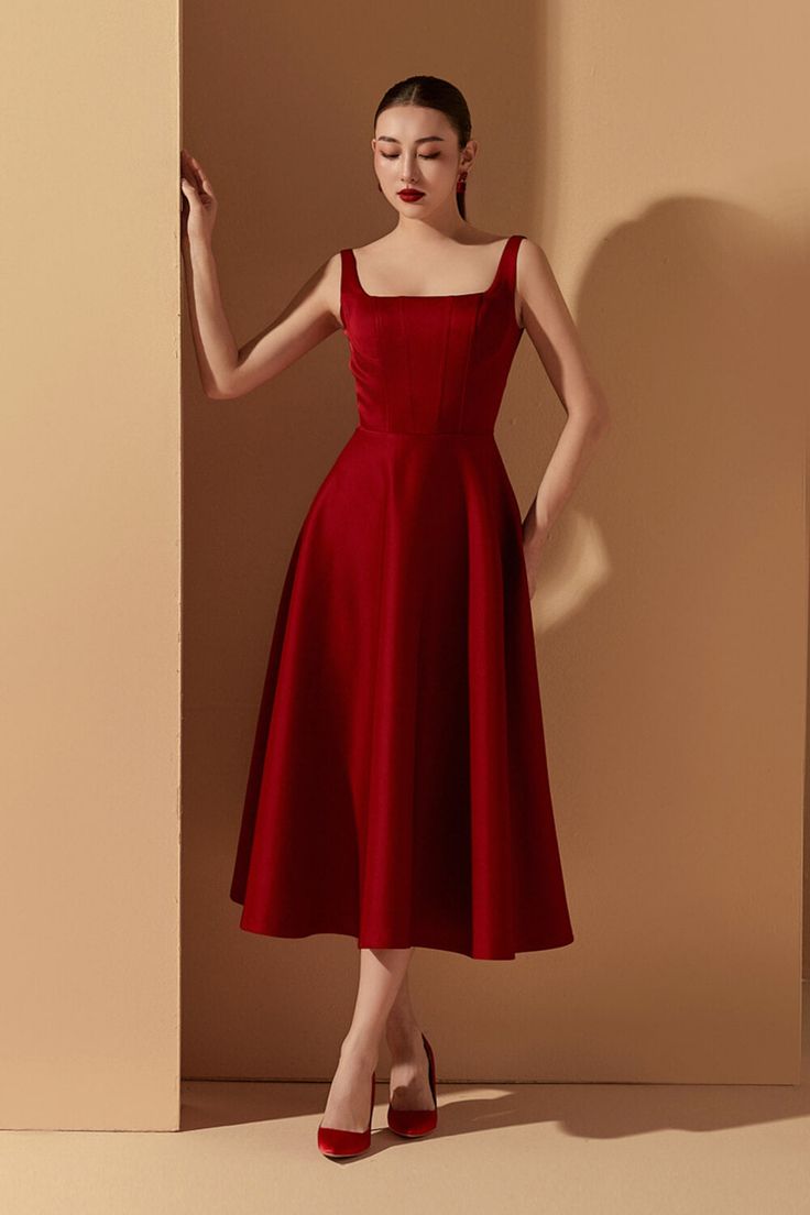 Indulge in elegance and luxury with our Dress. Crafted with the finest taffeta, this dress boasts an A-line silhouette and a flattering square neckline. Perfect for your next special occasion, this dress exudes sophistication and effortless style.