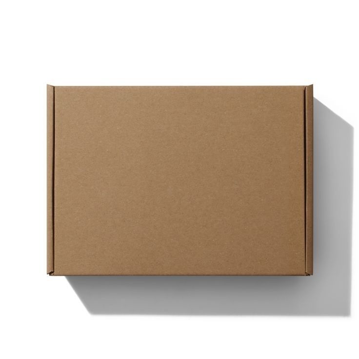 an open cardboard box on a white background with shadow from the wall and below it