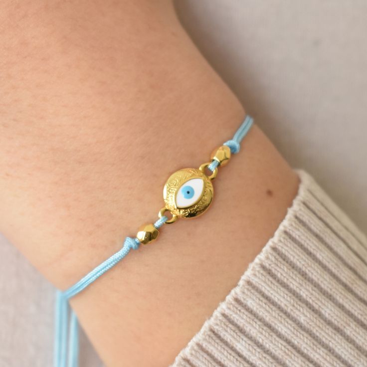 Discover protection and style with our Turkish evil eye bracelets. Blue lucky eyes, silver or gold, keep negativity at bay. The Turkish evil eye, also known as the blue evil eye, has been a powerful symbol of protection for centuries, believed to ward off negativity and bring good luck to its wearer. One of the most popular ways to carry this ancient protective charm is through evil eye bracelets, which come in various styles and materials, including silver, gold, and intricately designed eyebal Gold Adjustable Evil Eye Bracelet, Adjustable Gold Evil Eye Bracelet, Adjustable Gold Evil Eye Symbolic Bracelet, Evil Eye Friendship Bracelet Jewelry, Evil Eye Bracelet For Friendship, Gold Evil Eye Bracelet For Friendship, Gold Resizable Evil Eye Spiritual Bracelet, Gold Round Evil Eye Bracelet For Friendship, Gold Resizable Spiritual Evil Eye Bracelet