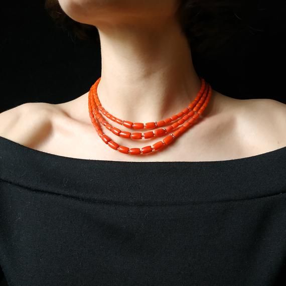 Natural coral necklace wıth mettalic furniture >  The product is made according to the model of authentic Ukrainian jewelry. The coral is natural, from the bottom of the Pacific Ocean. The ties are made of silk fabrics. They are pleasing to the body and make your look intresting even from behind. Orange Beads As A Gift, Orange Beaded Necklaces As Gift, Red Coral Necklace With Large Beads, Orange Polished Beads Necklace, Adjustable Red Coral Necklaces, Coral Beaded Necklaces With Large Beads, Adjustable Round Beads Shell Necklace, Orange Oval Beaded Necklaces As Gifts, Orange Oval Beaded Necklace For Gifting