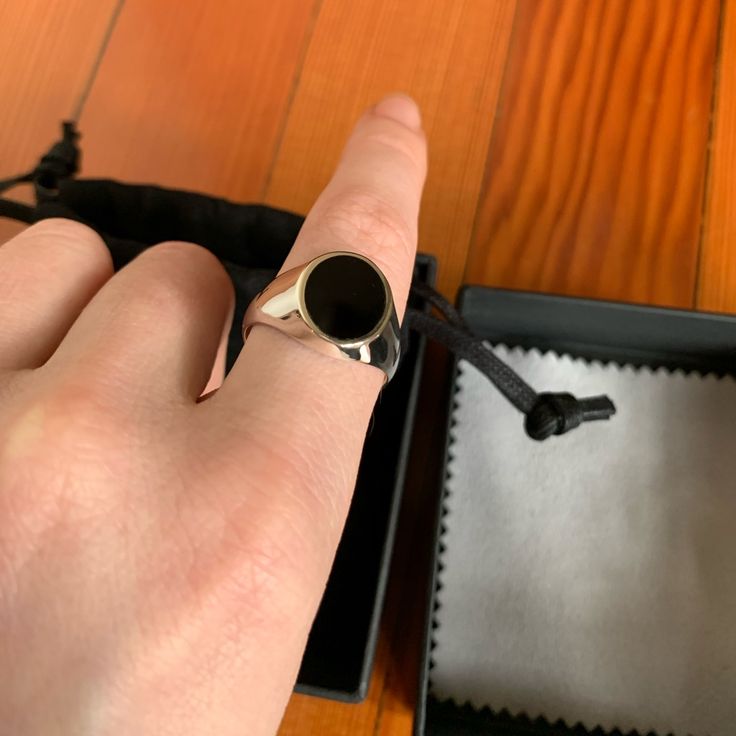 Black Onyx Signet Ring By Loupn. Oval Shaped Signet Made From Ag 925 Sterling Silver. Smooth Polished Finish. Never Worn, Brand New With Box. Here’s A Link With More Info & Sizing! Https://Www.Wolfandbadger.Com/Us/Black-Onyx-Signet-Ring-Sterling-Silver/ Black Sterling Silver Signet Ring, Black Signet Ring With Polished Finish, Adjustable Black Signet Ring With Polished Finish, Classic Black Adjustable Signet Ring, Black Sterling Silver Signet Ring With Polished Finish, Modern Black Sterling Silver Signet Ring, Everyday Black Signet Ring With Polished Finish, Black Minimalist Signet Ring With Polished Finish, Minimalist Black Signet Ring With Polished Finish