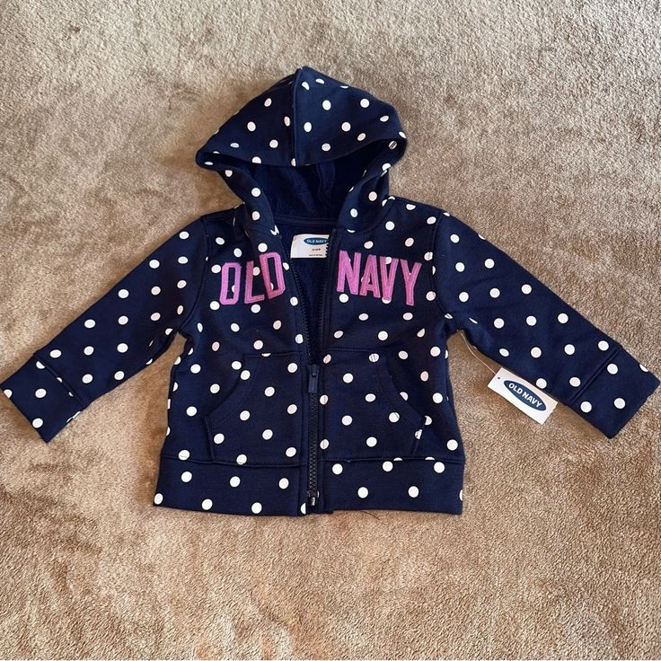 Baby Toddler Girls Old Navy Zip Up Hooded Sweatshirt Brand New With Tags Size 12 18 Months Navy With Polka Dots And Purple Brand Logo Thicker Sweatshirt Material To Use As Jacket Or Coat Spring Fall Winter Warm Cold Weather Zip-Up Jumper Hood Hooded Cotton Hooded Sweatshirt For Playwear, Hooded Cotton Sweatshirt For Playwear, Blue Cotton Hoodie For Playtime, Blue Hooded Top For Playtime, Cute Blue Tops With Drawstring Hood, Cotton Hoodie For Playtime, Cute Cotton Hoodie For Playwear, Cute Purple Cotton Hoodie, Cute Blue Hoodie Top