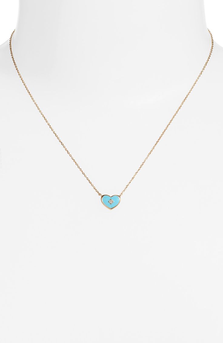 A twinkling diamond sparkles at the center of an enamel heart pendant set on a delicate 14-karat-gold chain. Total diamond weight: 0.03ct. Color: G Clarity: SI2 14k gold/enamel/diamond Made in Canada >Diamond Guide Elegant Heart Cut Enamel Jewelry, Elegant Enamel Heart Cut Jewelry, Blue 14k Gold Heart Pendant Jewelry, Blue Heart Charm Necklaces, Luxury Heart-shaped Enamel Jewelry, Yellow Gold Enamel Heart Charm Jewelry, Yellow Gold Enamel Heart Pendant Necklace, Blue Heart Pendant Necklace With Diamond Accents, Elegant Enamel Heart Pendant Jewelry