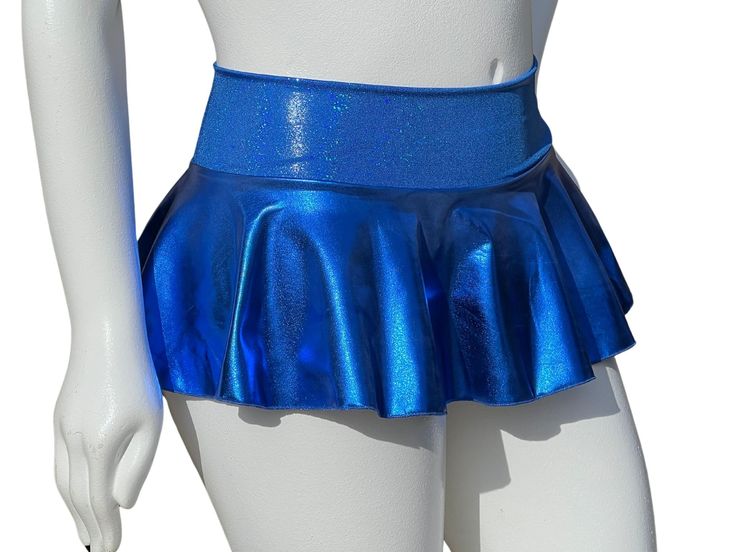 "Stand out in the music festival crowd in this Made-To-Order Blue Liquid Metal Rave Skirt! Not only is it beautiful, but the skirt is made from quality performance spandex that is comfortable and will last. The waistband is a double layer of spandex and the skirt is a full circle. The base skirt is hemmed. Feel free to twirl, dance, and sit comfortably in this skirt.  Size Chart (by waist measurement) **Please measure where you will wear the waistband to insure the proper fit** XS 24-26\" S 27-29\" M 30-33\" L 34-36\" XL 37-39\" 2X 40-42\" Lengths are measured from the top of the waistband to the bottom of the base skirt. The waistband is approximately 3\" tall. Micro 10\" Mini 12\"  Sport 15\"  Optional attached shorts will be made out of the same fabric as the main base skirt and will ha Stretch Skort For Club, Short Length, Stretch Skort For Club, Stretch Short Skort For Club, Stretch Short Length Skort For Club, Fitted Club Skort In Short Length, Fitted Short Skort For Club, Fitted Disco Shorts For Club, Disco Style Fitted Club Shorts, Disco Style Fitted Shorts For Club