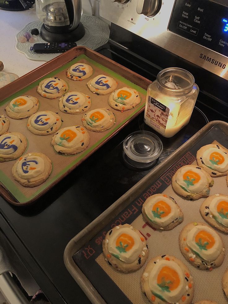 there are cookies that have been made on the stove and ready to be baked in the oven