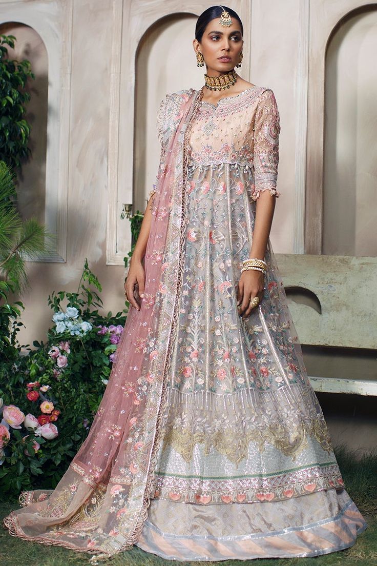 Royal Pakistani Wedding Dress in Lehenga Frock Style Bollywood Style Floor-length Anarkali Set For Ceremony, Embellished Gown For Wedding Eid Festival, Embellished Gown For Wedding And Eid, White Hand Embellished Anarkali Dress, White Anarkali Dress Hand Embellished, Embellished Anarkali Dress For Ceremony, Hand Embellished Organza Gown For Ceremony, Elegant Gown With Sheer Dupatta For Ceremony, Elegant Wedding Dress For Eid Ceremony