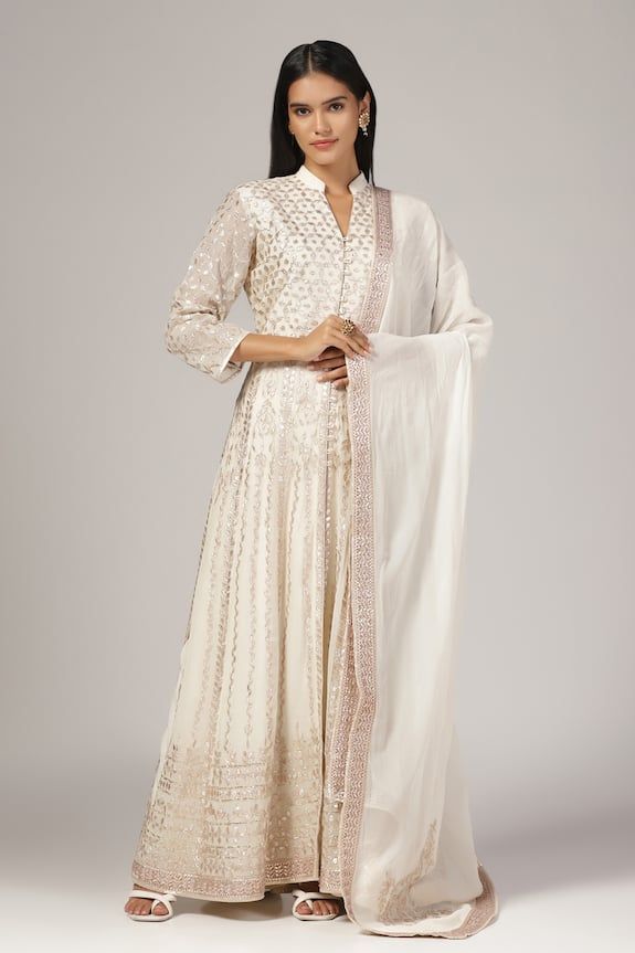 White silk chanderi anarkali with gota patti embroidery. Comes with an organza dupatta. - Aza Fashions Tissue Silk Anarkali Set With Gota Work For Diwali, Organza Churidar With Dupatta For Reception, Navratri Tissue Silk Anarkali Set With Mirror Work, Navratri Anarkali Set With Mirror Work In Tissue Silk, Navratri Anarkali Set With Gota Work In Tissue Silk, White Silk Floor-length Anarkali Set, Festive Organza Anarkali Set, Designer Resham Embroidery Anarkali Set In Organza, Designer Organza Anarkali Set With Resham Embroidery