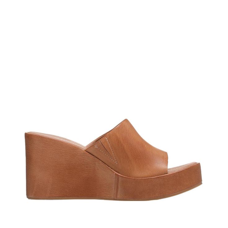 I31 Bala Casual Slip On Wedges Not just another flip flop, the cut here boasts a fascinating presence that is both unconventional and beautiful, for the style savvy. The leather is oiled to perfection and the sole displays unique clean lines. Get ready with warm weather ahead with a wedge that can be paired with endless ensembles. Details Upper made of fine quality leather Insole is latex cushioned and coated in smooth breathable leather Height is 4 If you like Casual Slip On WedgesFind your sol